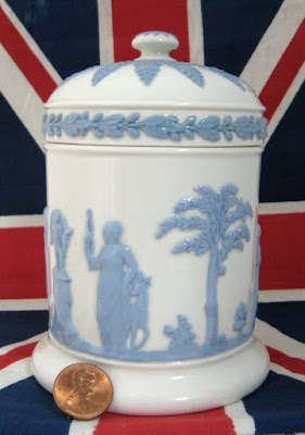 https://timewasantiques.net/collections/wedgwood/products/wedgwood-queens-ware-box-cylinder-lidded-classical-figures-1960s-blue-on-white