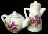 Click here to enlarge image and see more about item 5844ba: Salt And Pepper Teapot Coffeepot Pansy Royal Patrician