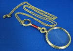 Click here to enlarge image and see more about item 8494: Magnifier Necklace Faberge Reproduction MOA NY Red
