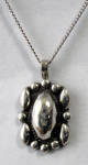Click here to enlarge image and see more about item 8498a: Vintage Mexican Sterling Silver Pendant And Chain FA