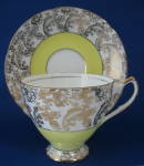 Fancy Cup And Saucer Gold Overlay Yellow And White