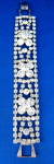 Click here to enlarge image and see more about item 9914: Vintage Bracelet Fancy Rhinestones Raised Flowers Articulated